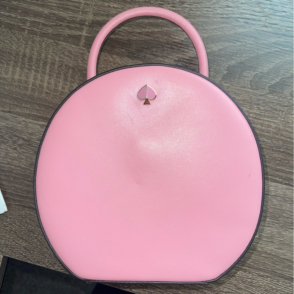 Pink Kate spade circular purse
